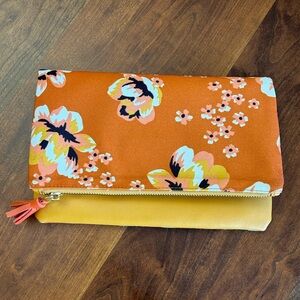 Rachel Pally fold over clutch purse. Golden yellow and floral, reversible.